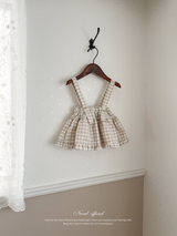 Pair check suspender skirt