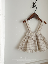 Pair check suspender skirt
