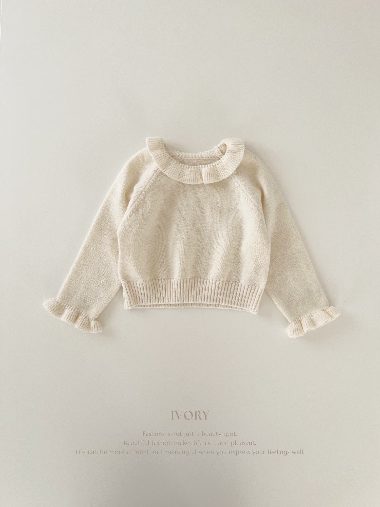 Biscuit frill knit tops