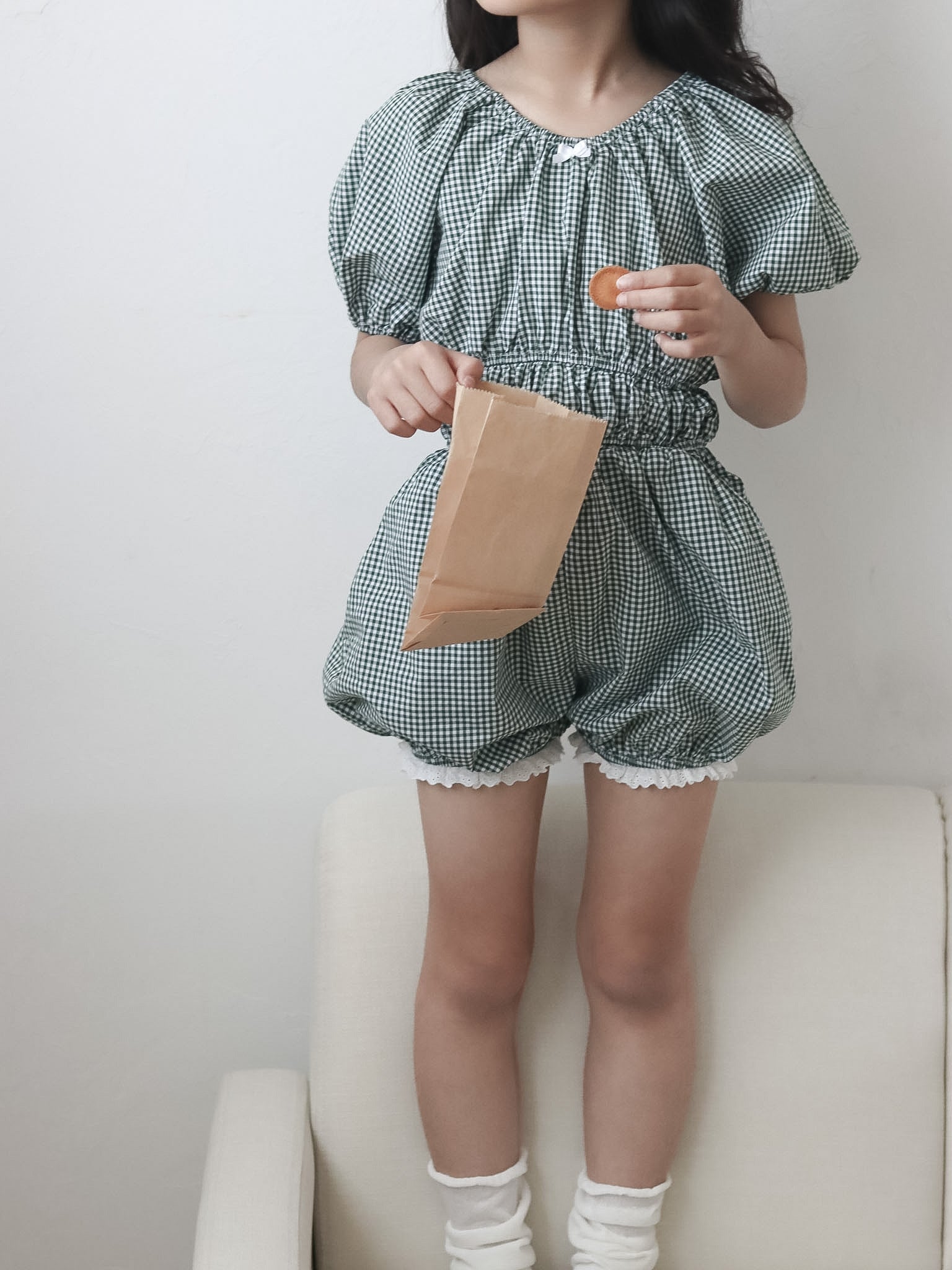 Check one-piece suit