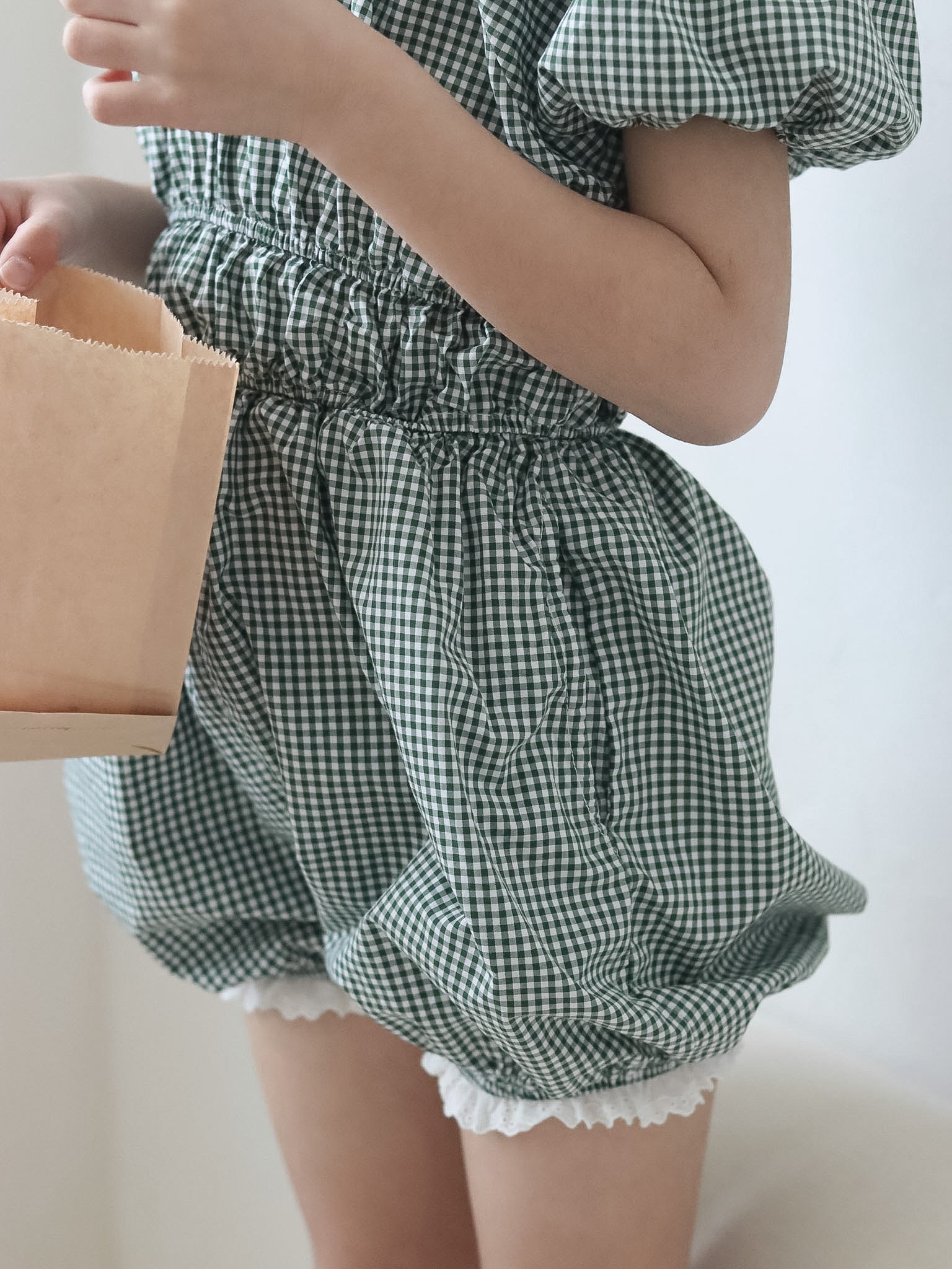 Check one-piece suit