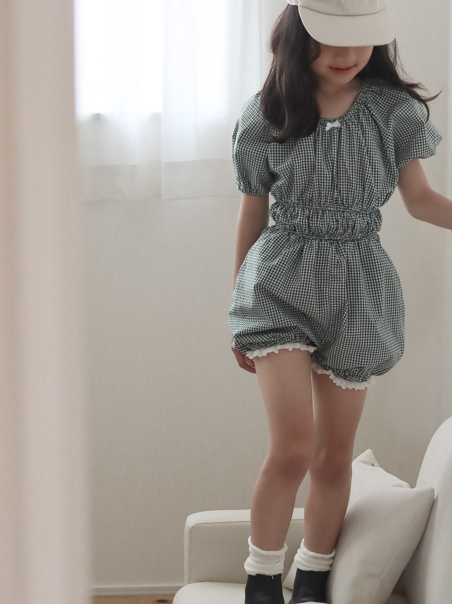 Check one-piece suit