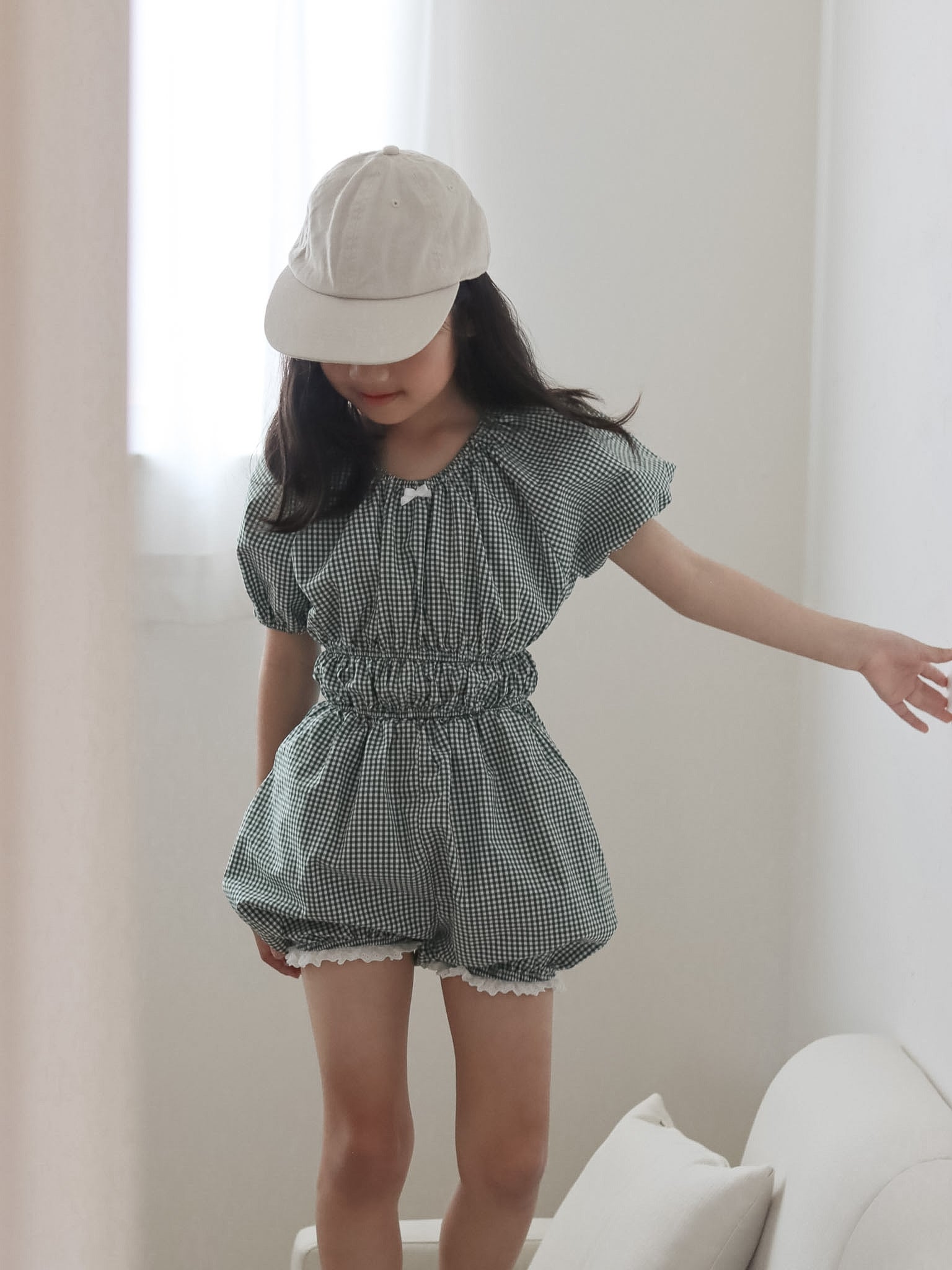 Check one-piece suit