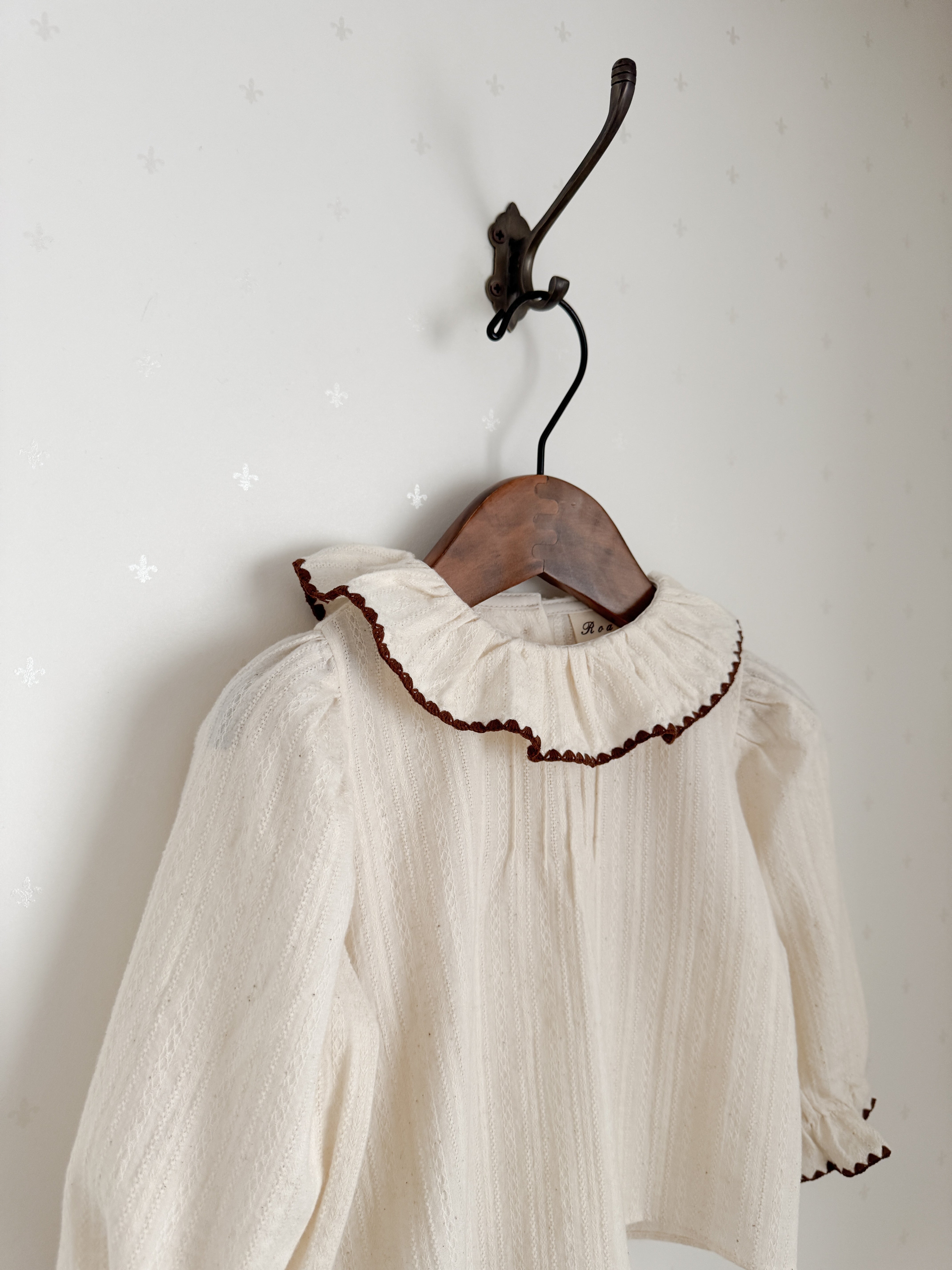 Tuck frill blouse
