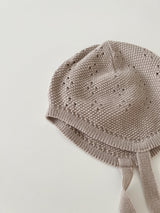 Eyelet dongle beanie