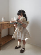 Pair check suspender skirt