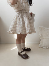 Pair check suspender skirt