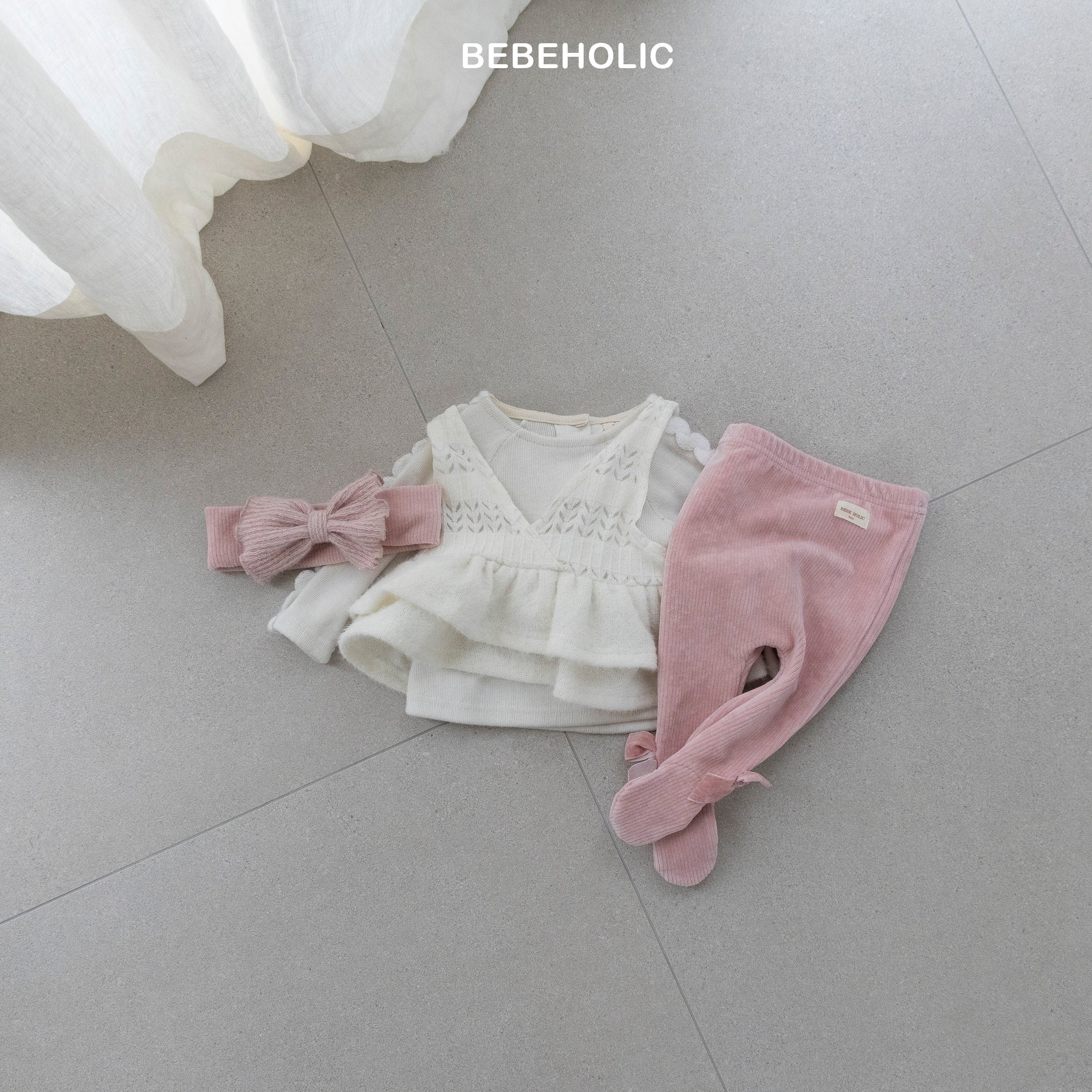 ［bebe holic］Ribbon foot leggings