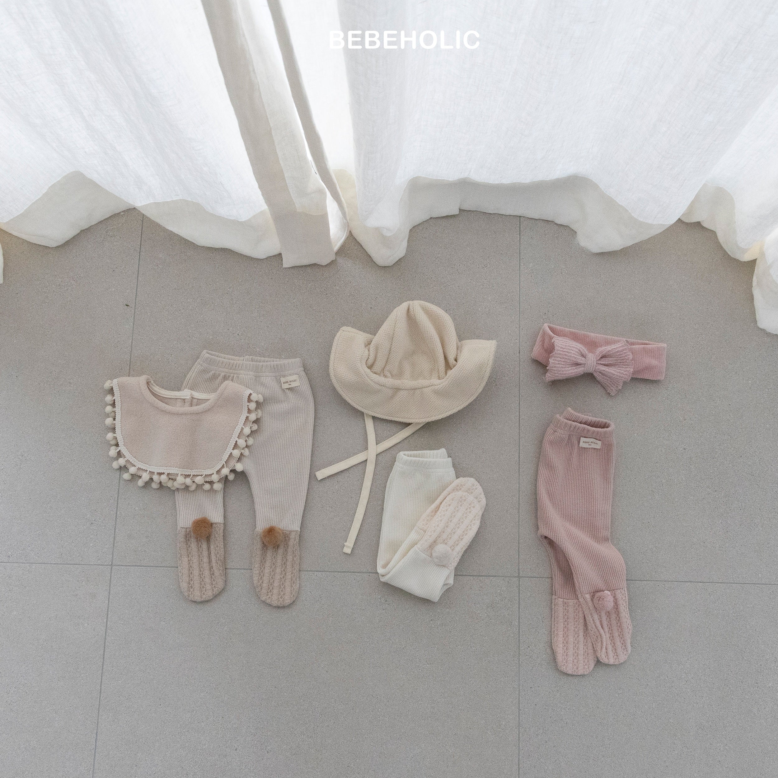 ［bebe holic］Pompom foot leggings