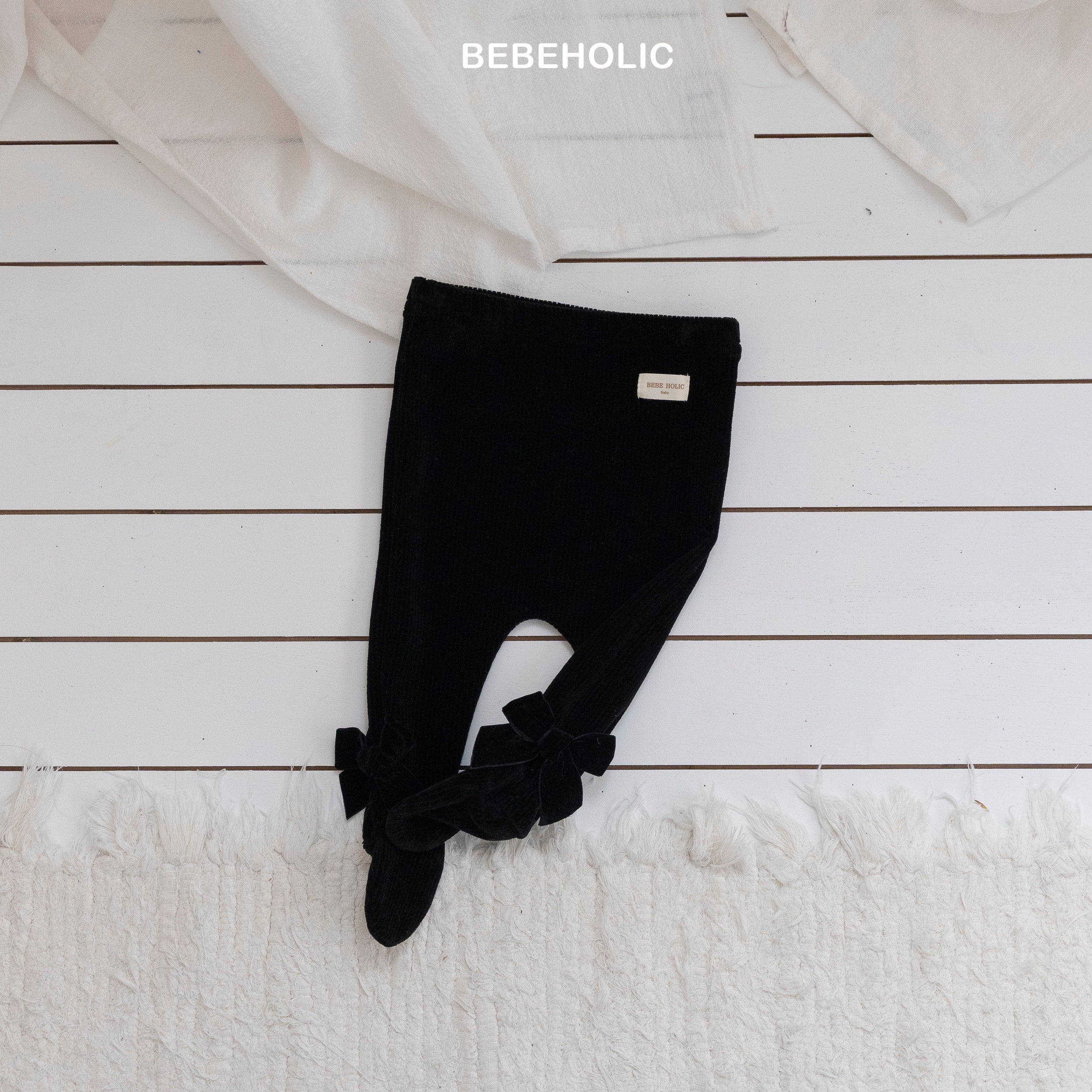［bebe holic］Ribbon foot leggings
