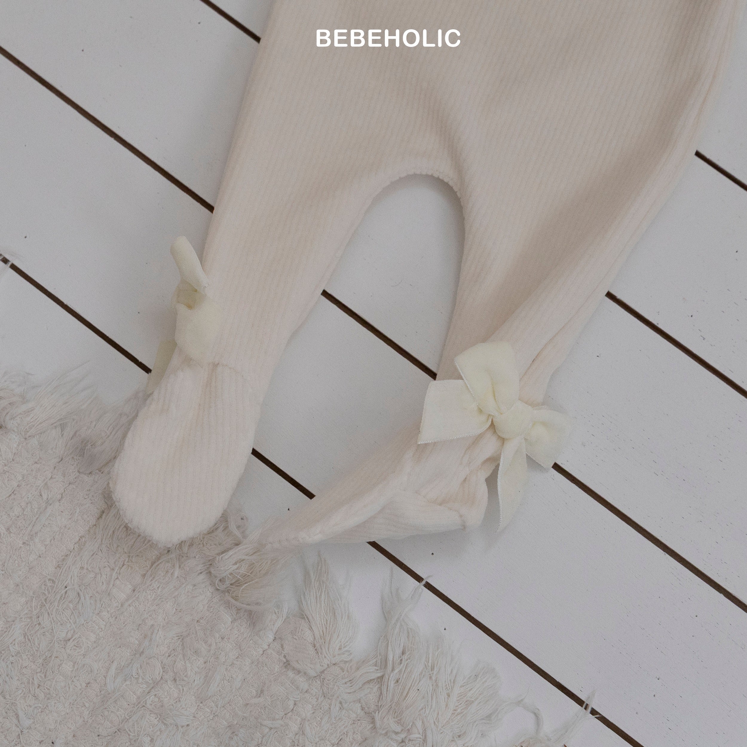 ［bebe holic］Ribbon foot leggings