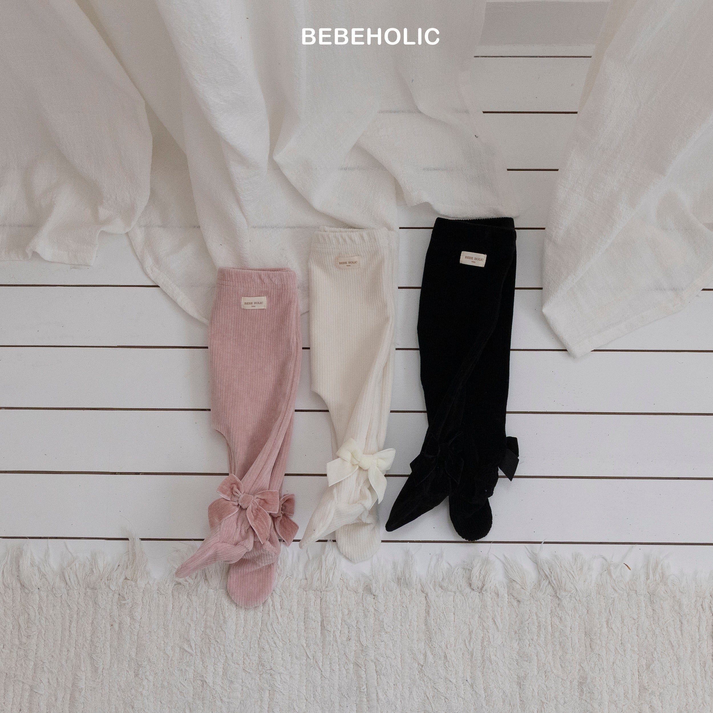 ［bebe holic］Ribbon foot leggings