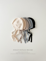 Eyelet dongle beanie