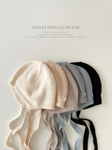 Eyelet dongle beanie