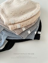 Eyelet dongle beanie