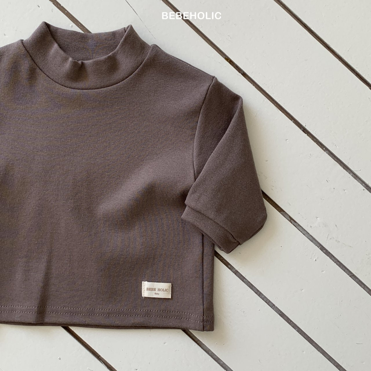 ［bebe holic］Magic half neck tee