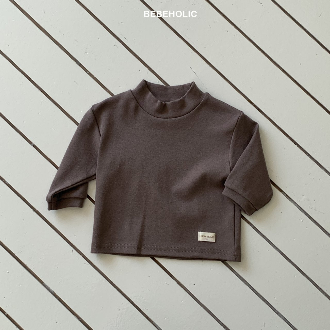 ［bebe holic］Magic half neck tee