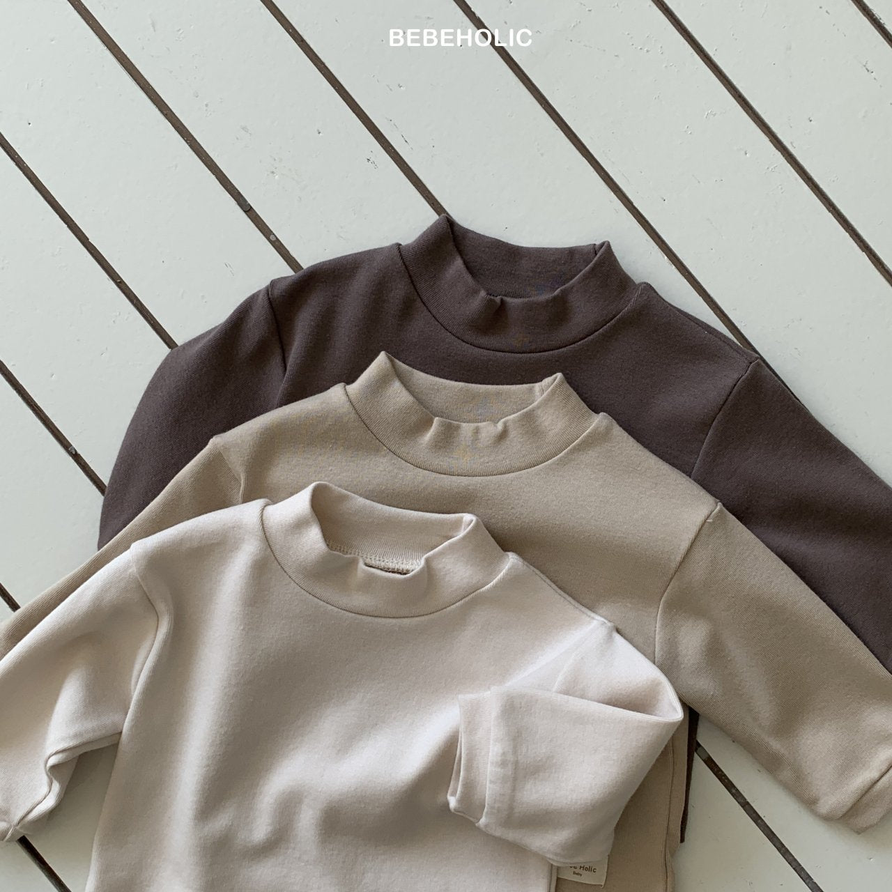 ［bebe holic］Magic half neck tee