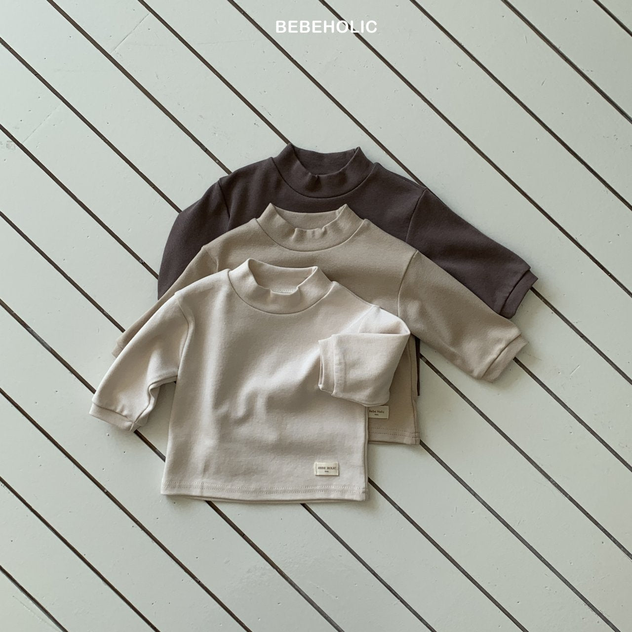 ［bebe holic］Magic half neck tee