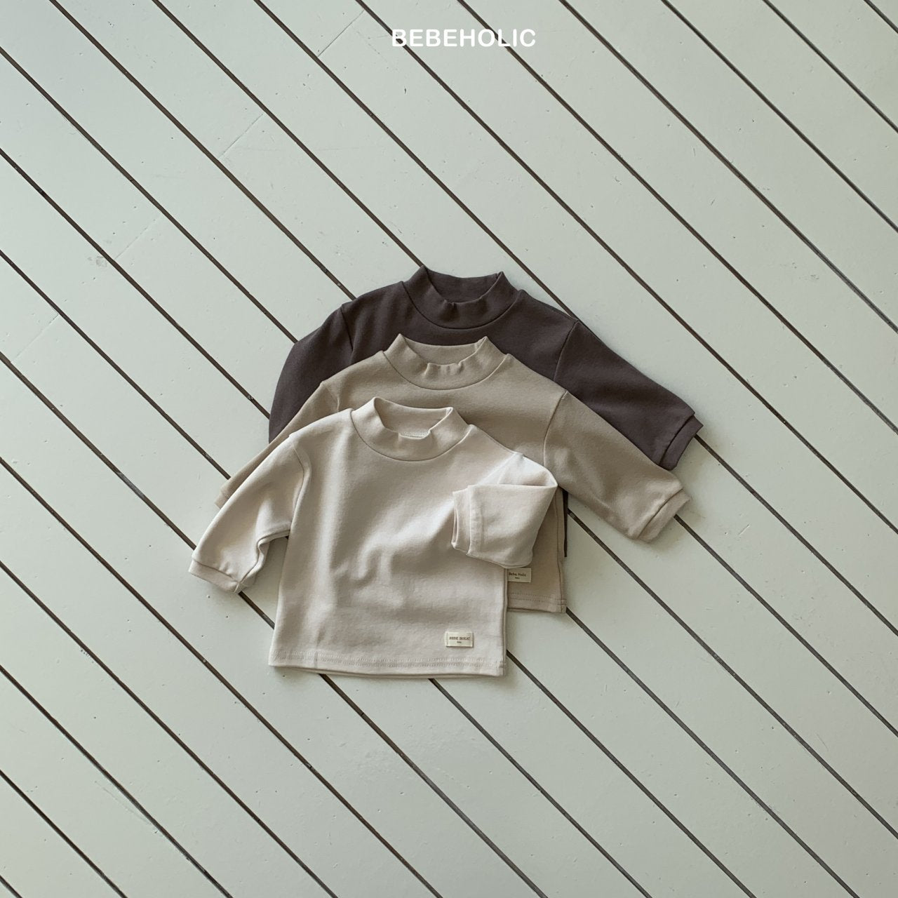 ［bebe holic］Magic half neck tee