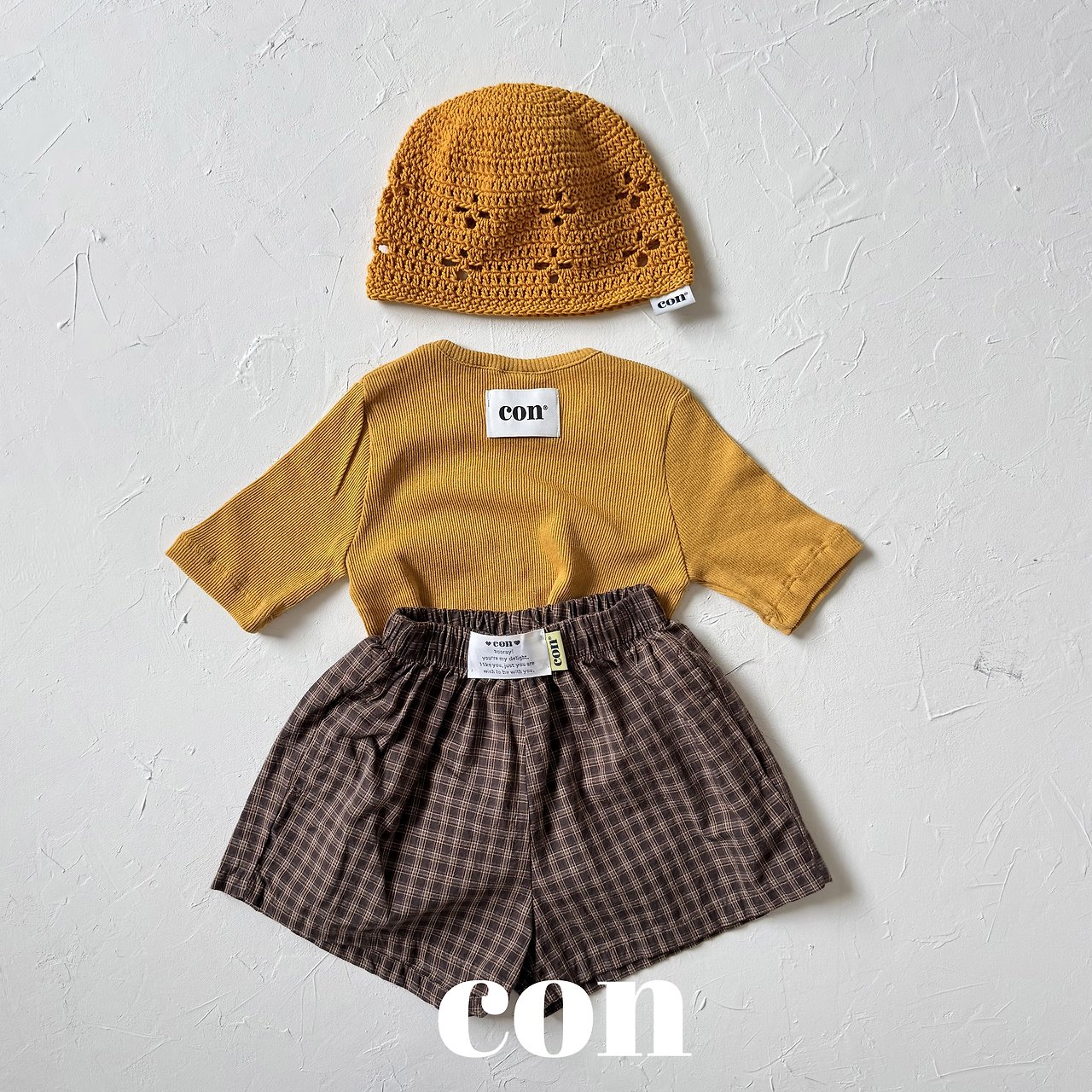 ［con］Checks short pants