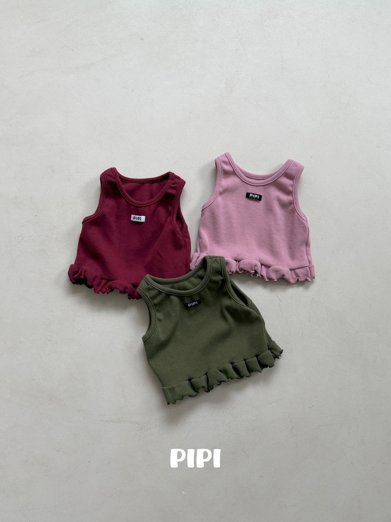 ［pipi］Color frill sleeveless tops