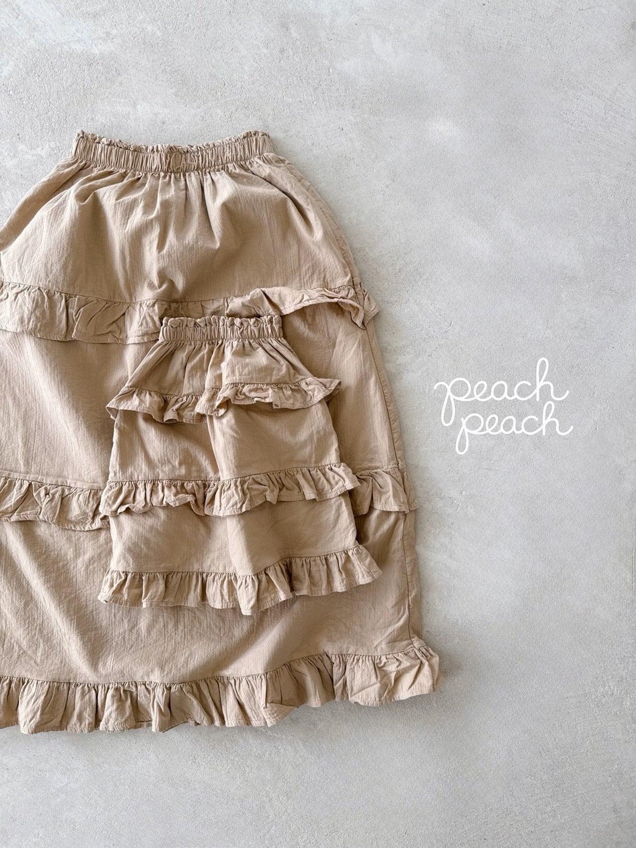 ［peach peach］Custard frill skirt