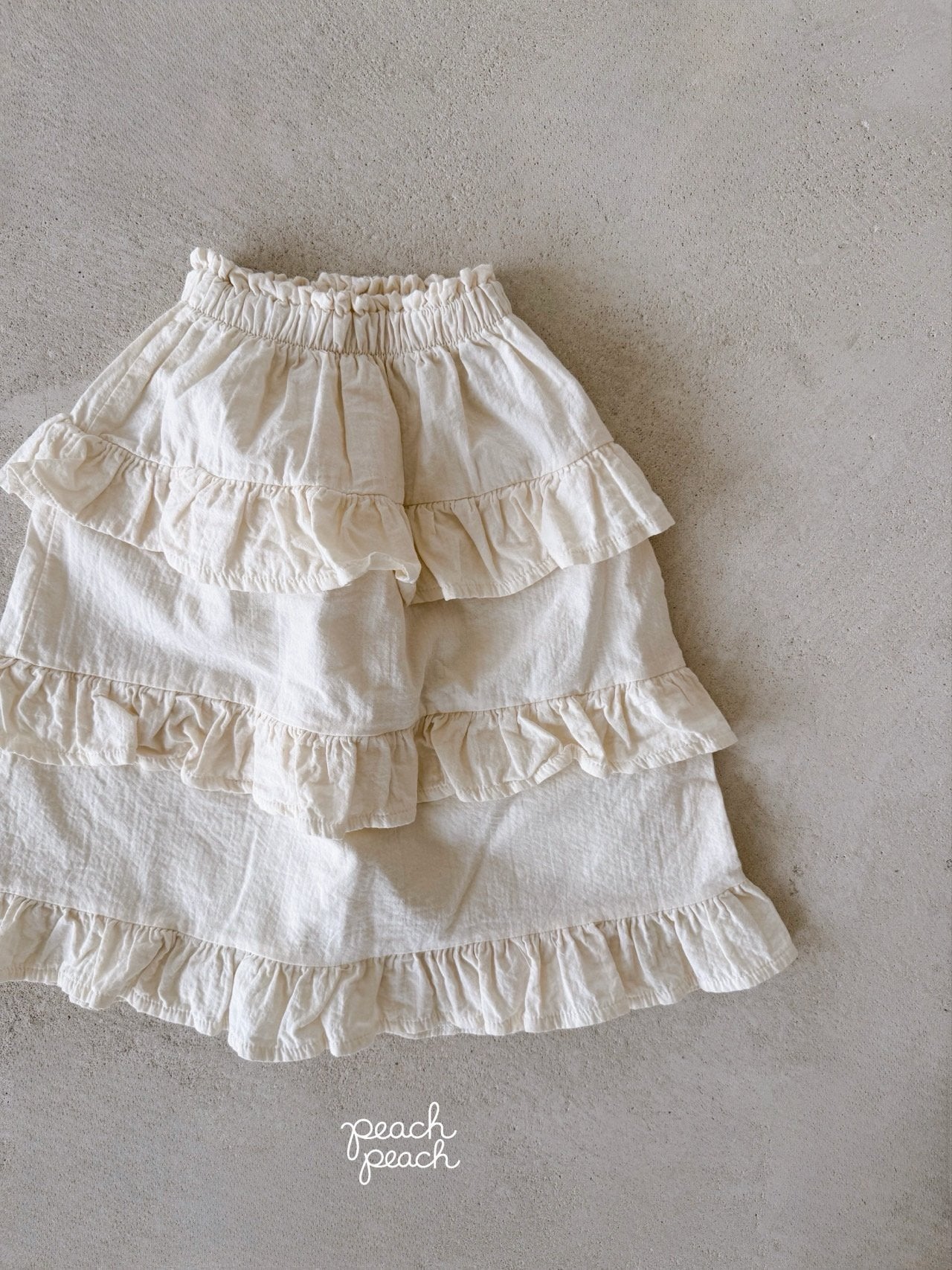 ［peach peach］Custard frill skirt