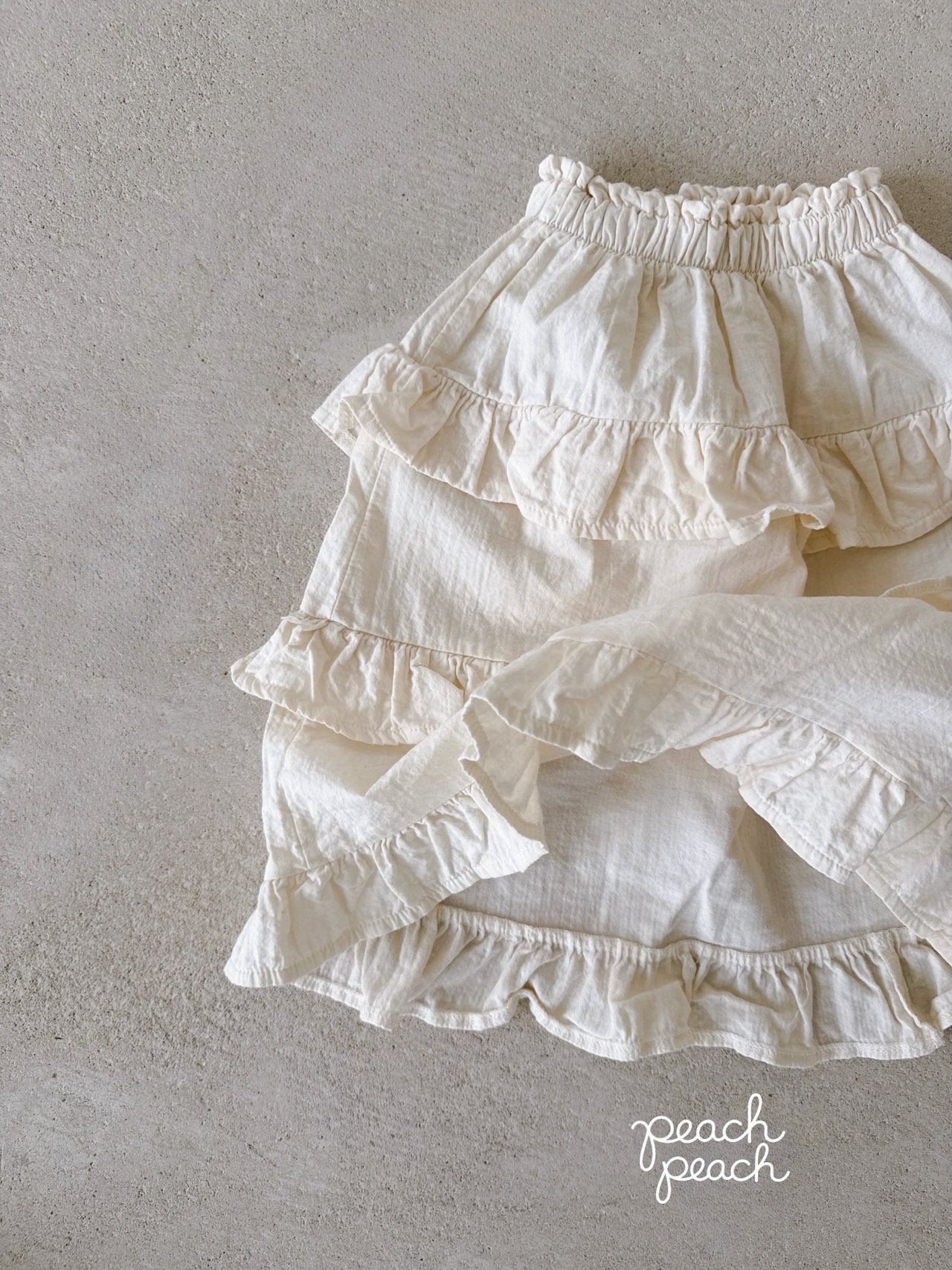 ［peach peach］Custard frill skirt