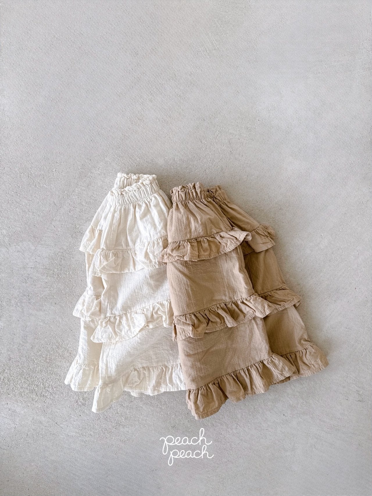 ［peach peach］Custard frill skirt