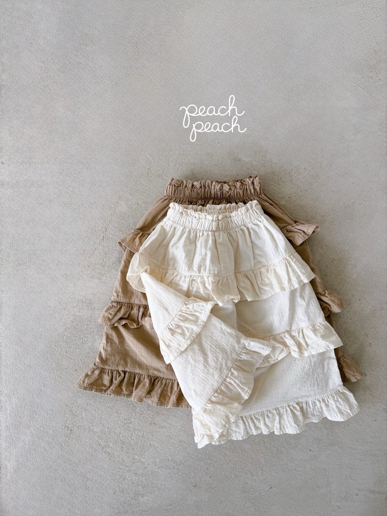 ［peach peach］Custard frill skirt