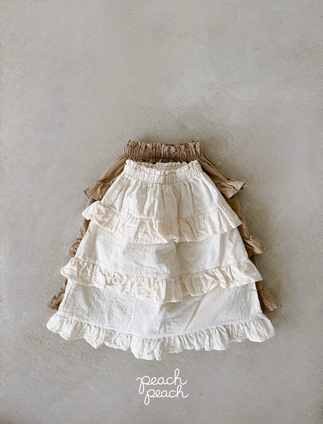 ［peach peach］Custard frill skirt