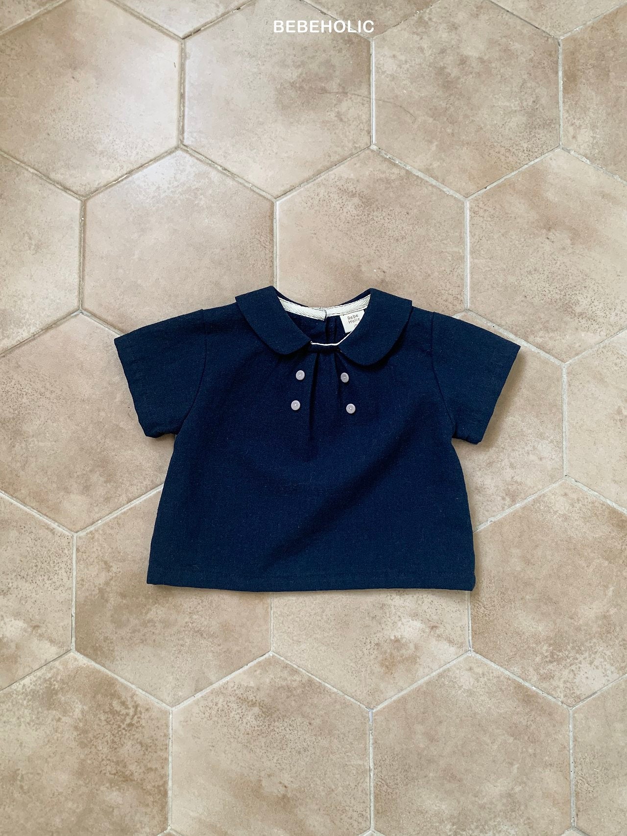 ［bebe holic］Mild double button blouse
