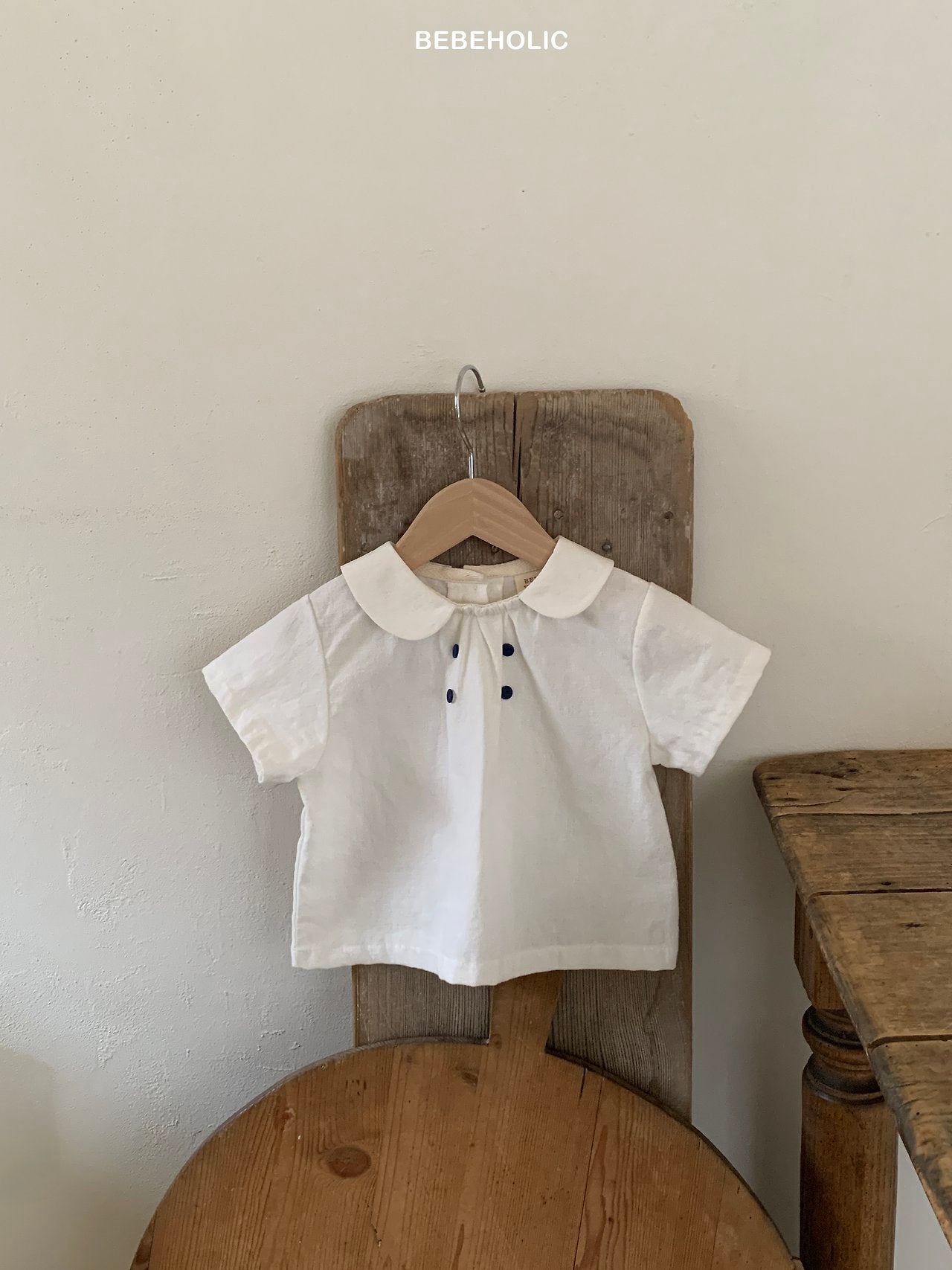 ［bebe holic］Mild double button blouse