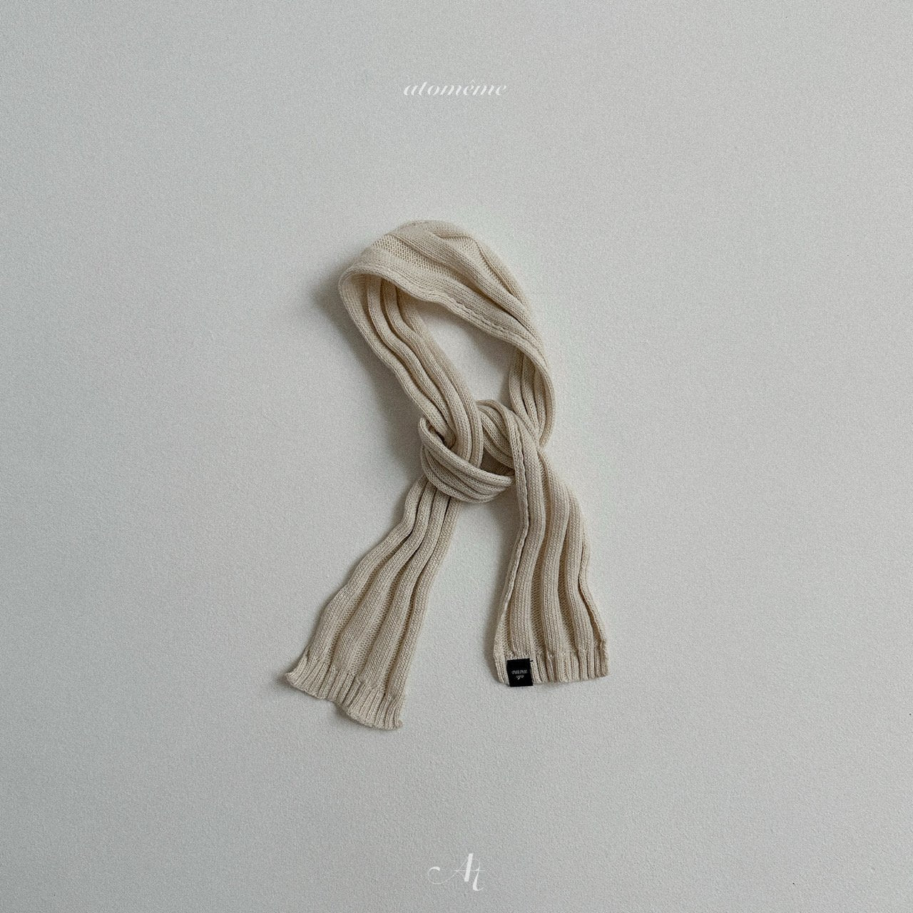 [atomeme] Almond knit muffler