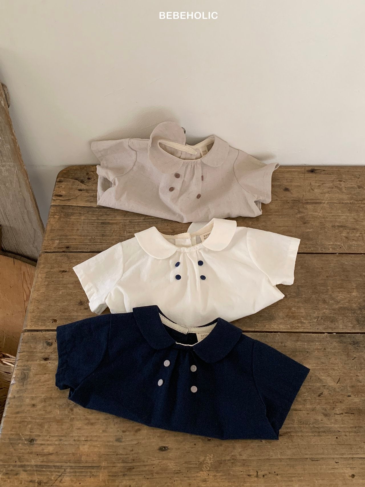［bebe holic］Mild double button blouse